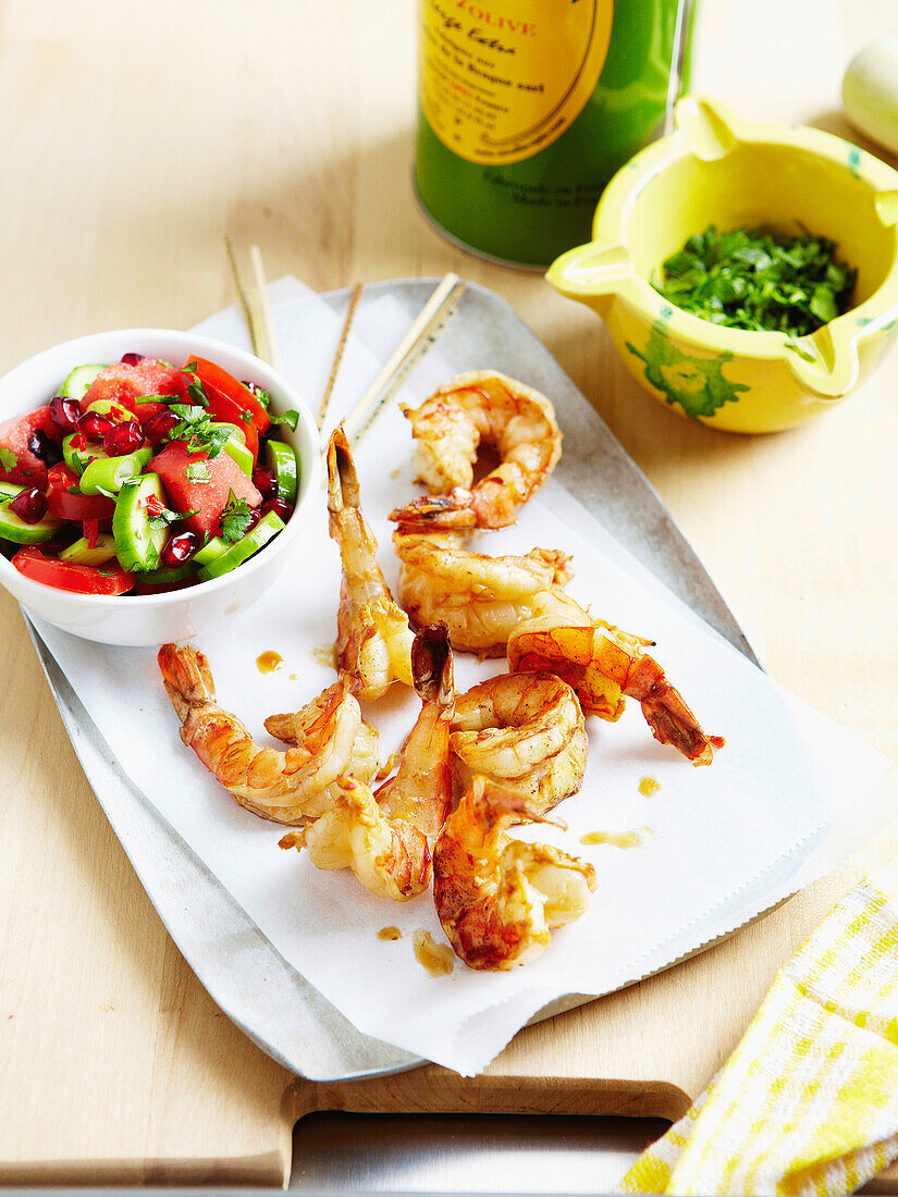 Grilled shrimps with cucumber,watermelon,tomato and pomegrante salad