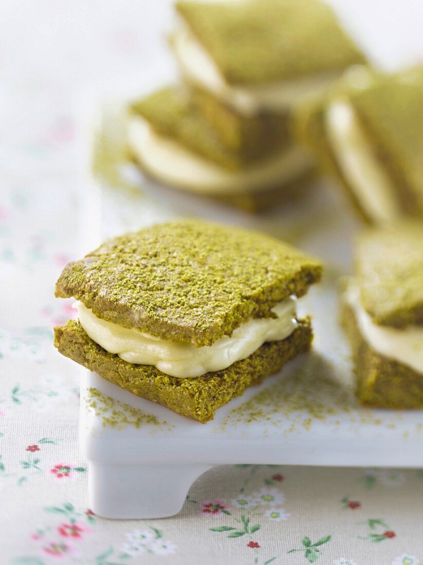 Matcha tea cookie sandwiches filled with white chocolate Ganache