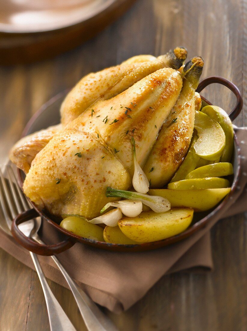 Chicken cooked with cider ,apples and potatoes