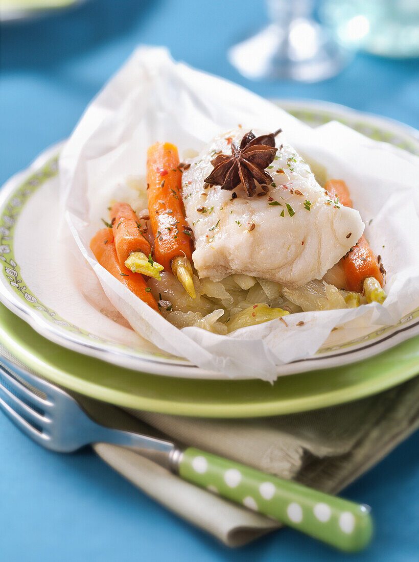 Bass with fennel,carrots and star anise cooked in wax paper