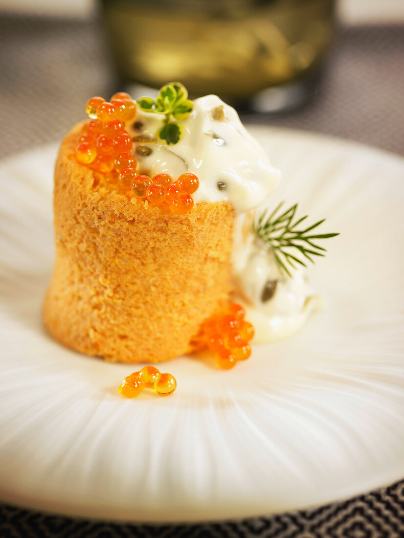 Fish pudding with leeks, carrots and tomatoes