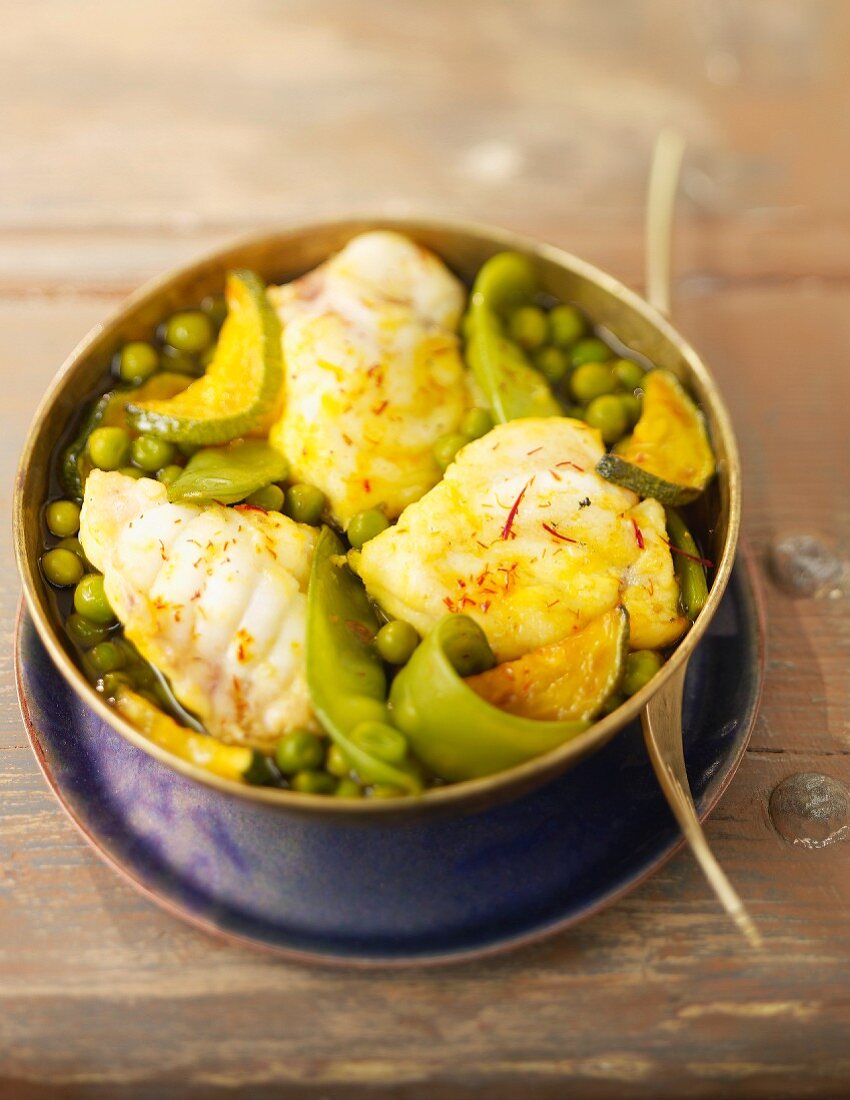 Monkfish, pea and saffron Tajine