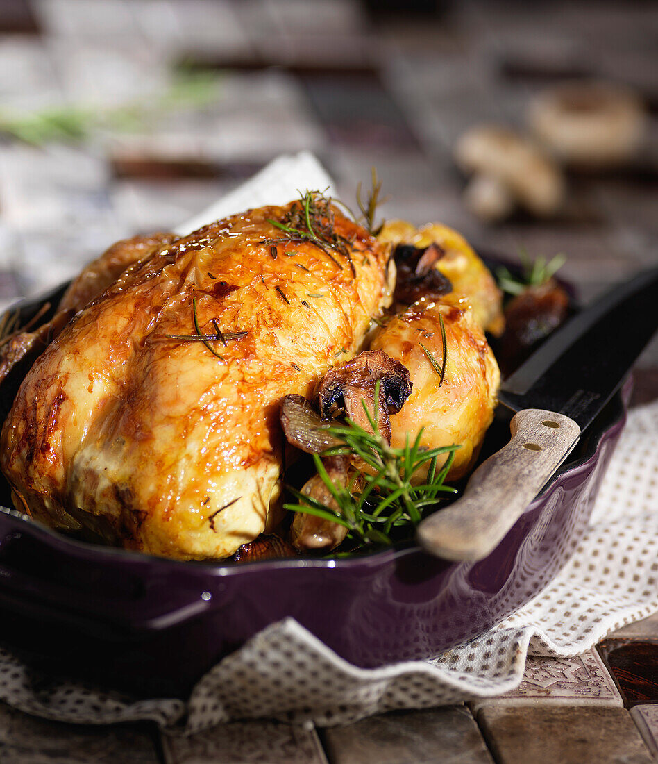 Roast chicken with rosemary and mushrooms