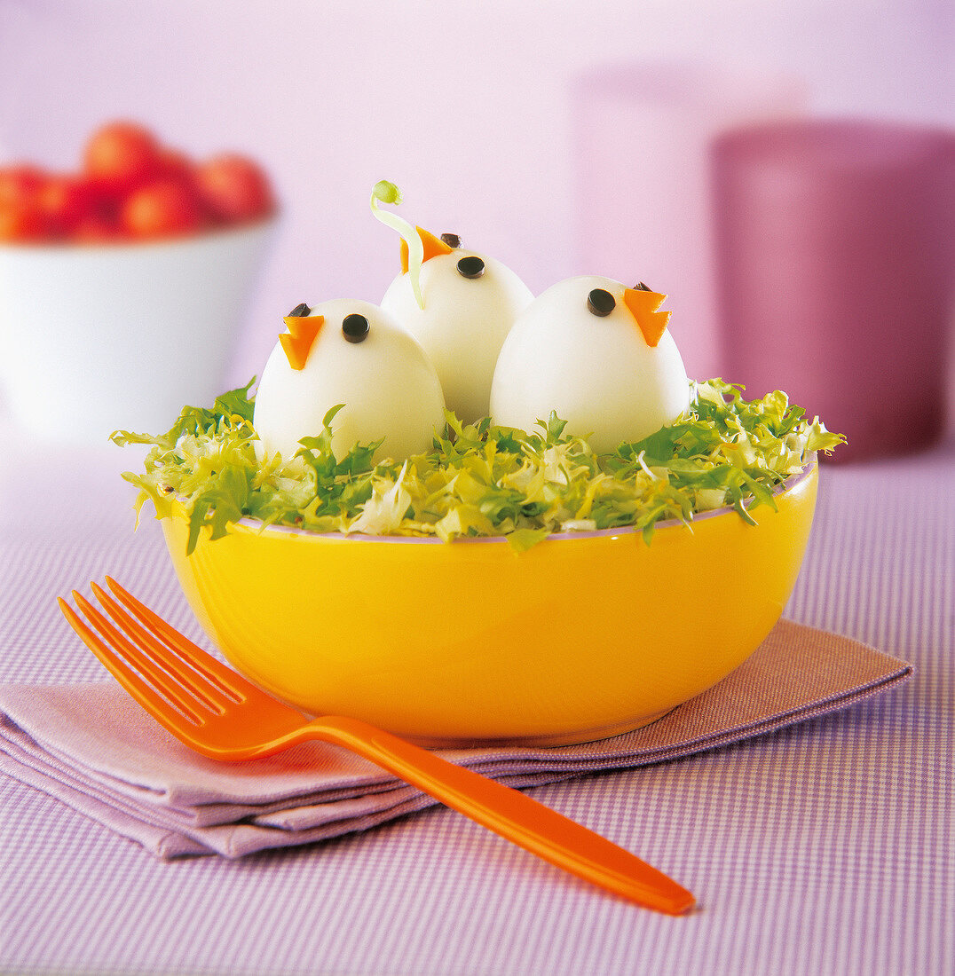 Lettuce salad with chick-shaped hard-boiled eggs