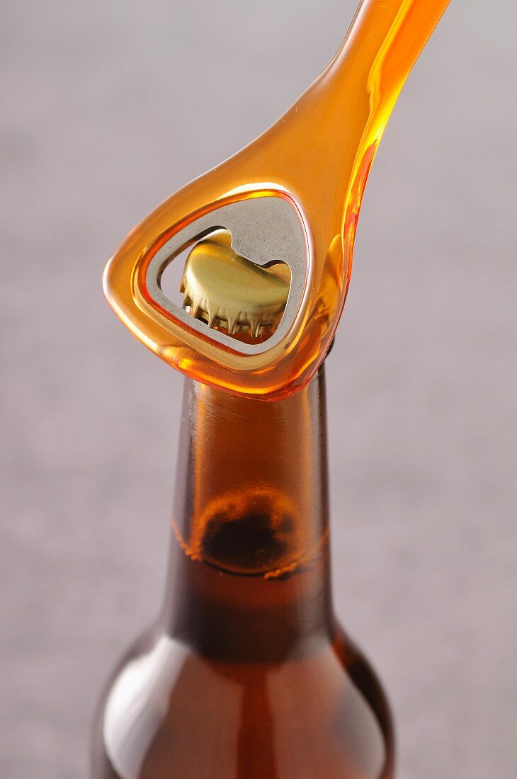 Opening a bottle of beer