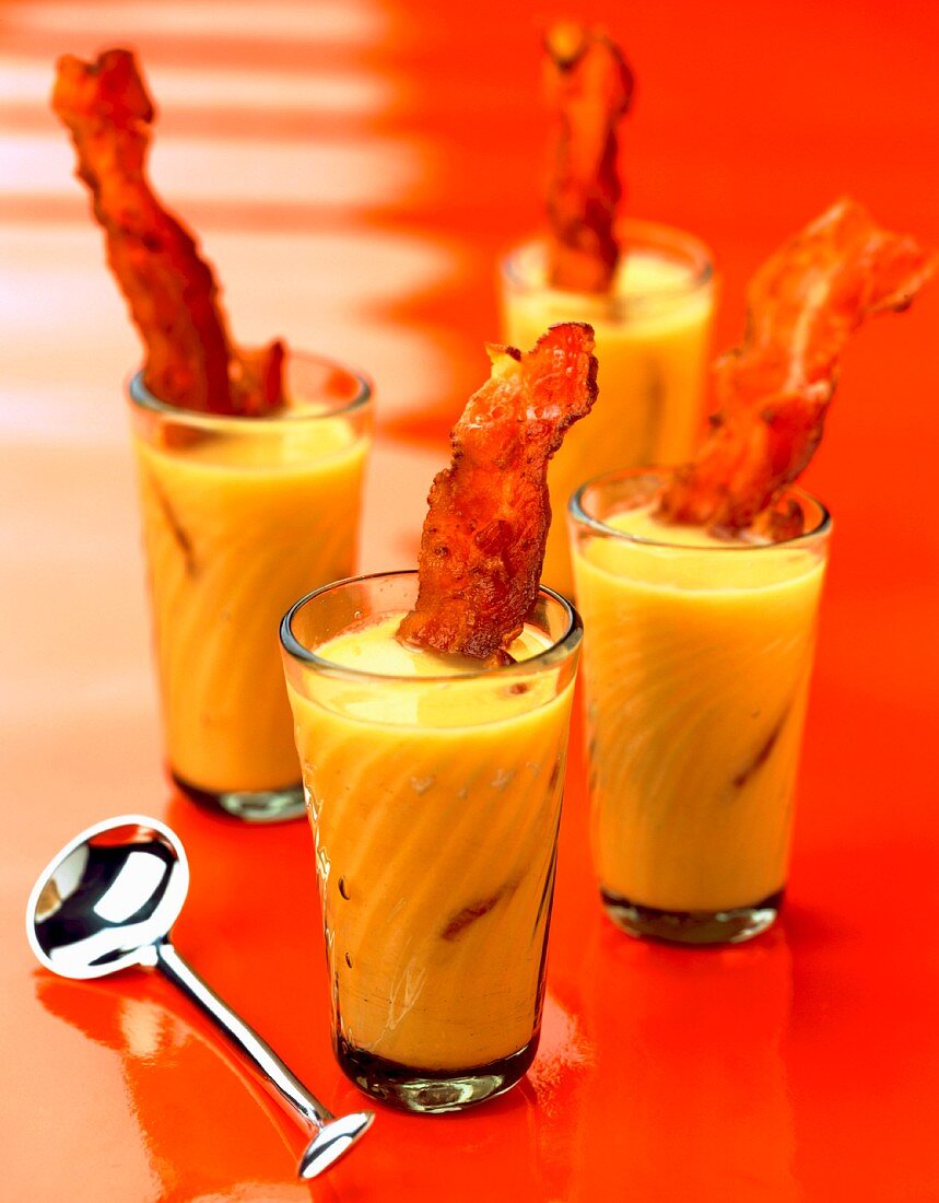 Cream of carrot soup with crisp smoked bacon