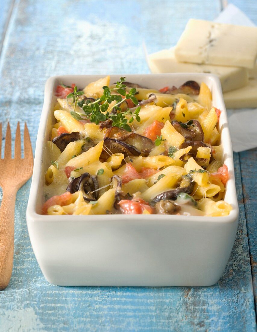 Pasta, eggplant and Morbier cheese-topped dish