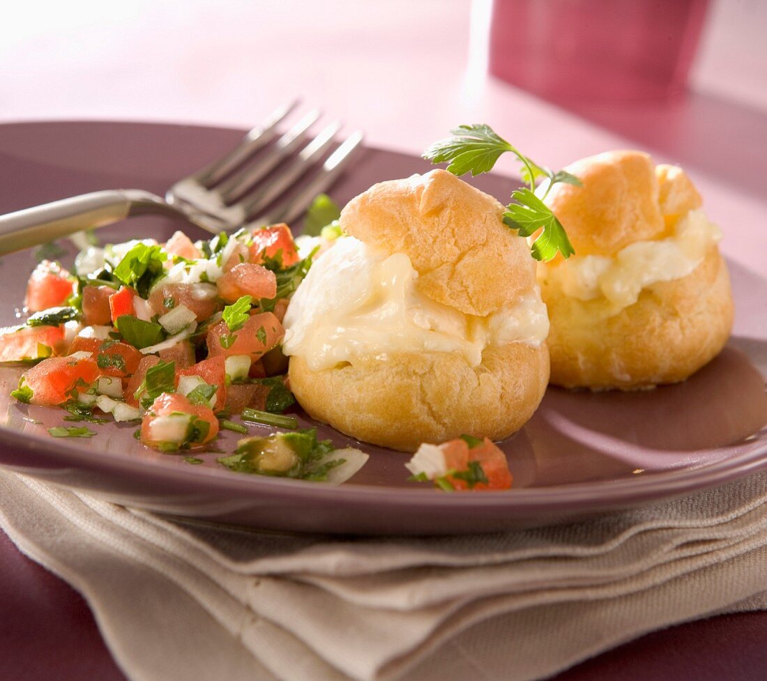 Cheese cream puffs with tomato and herb salad
