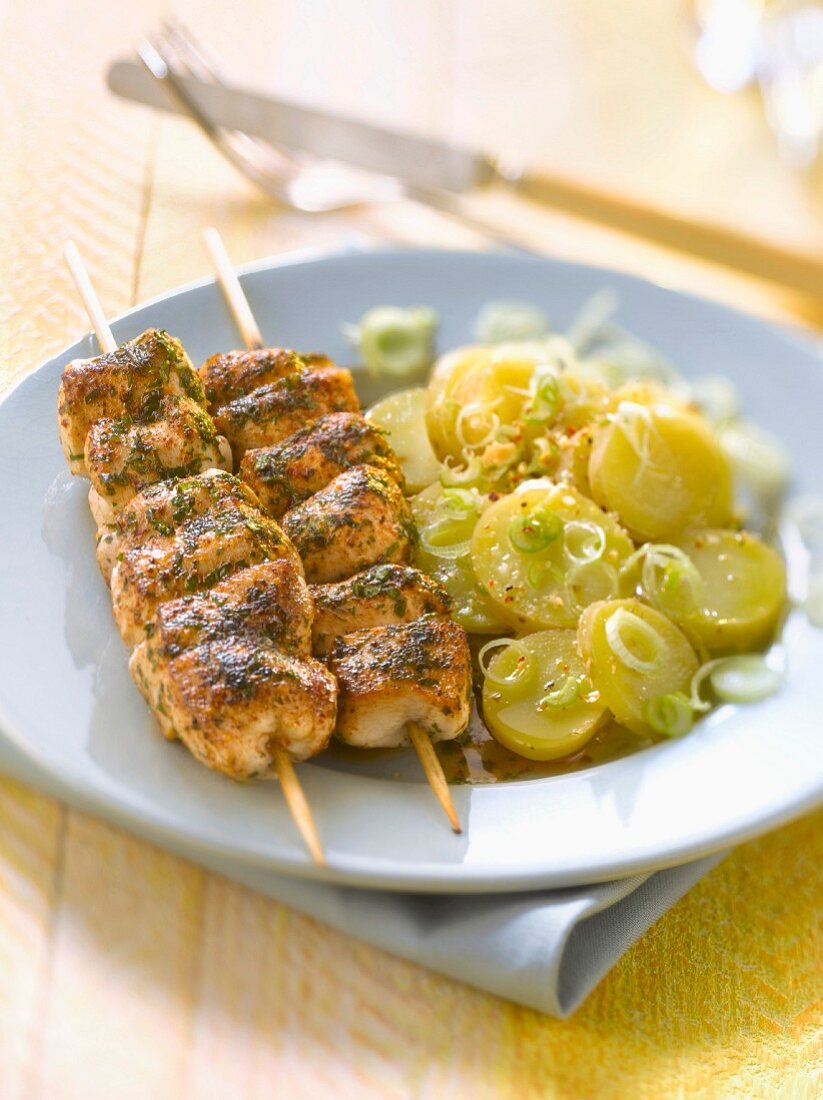 Oriental -style marinated chicken brochettes with Ratte potato salad