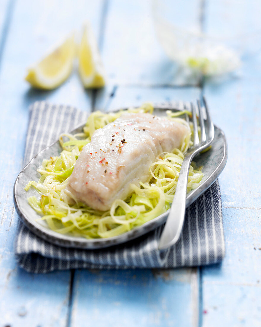 Thick piece of pollock with leeks