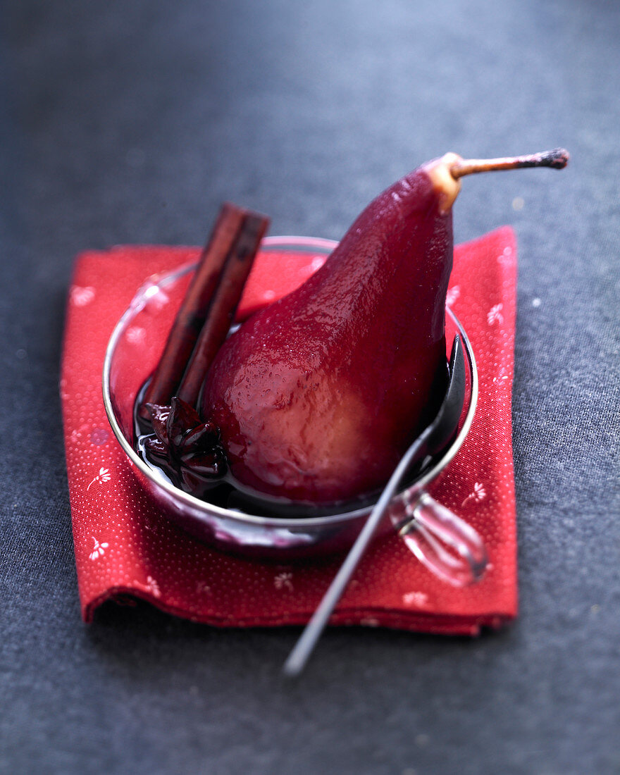 Spicy red wine poached pear