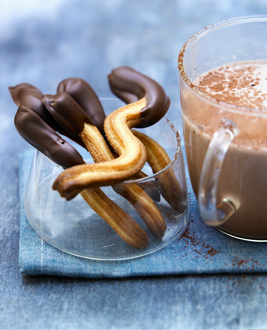 Churros-style shortbread cookies partially coated in chocolate