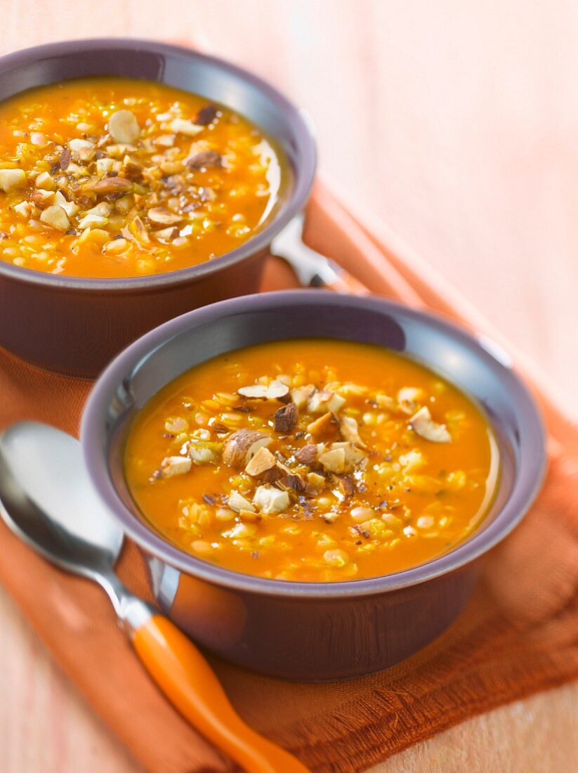 Orange lentil soup with roasted hazelnuts