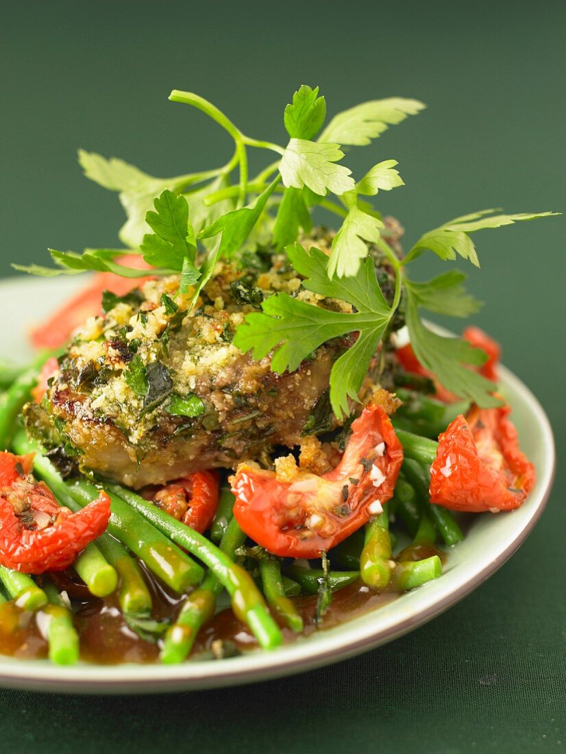 Veal coated in herbs,green beans with tomatoes