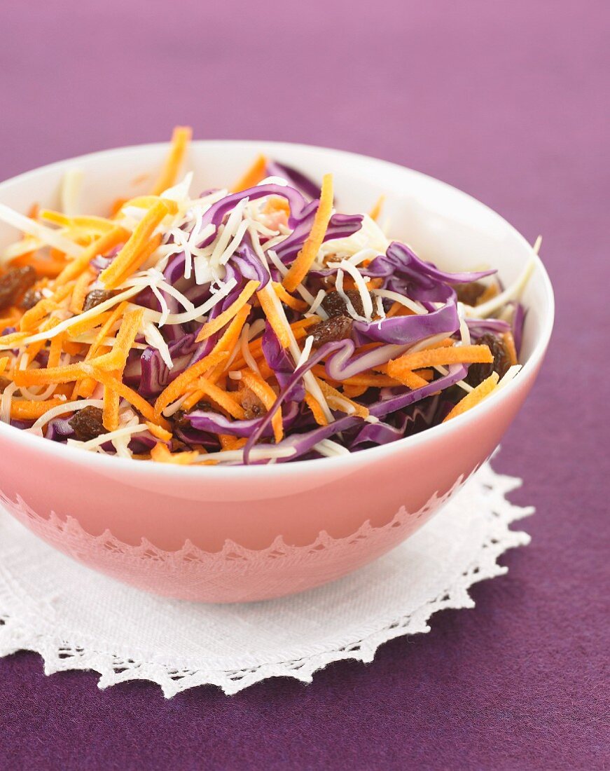 Grated carrot, red cabbage and celeriac salad with raisins