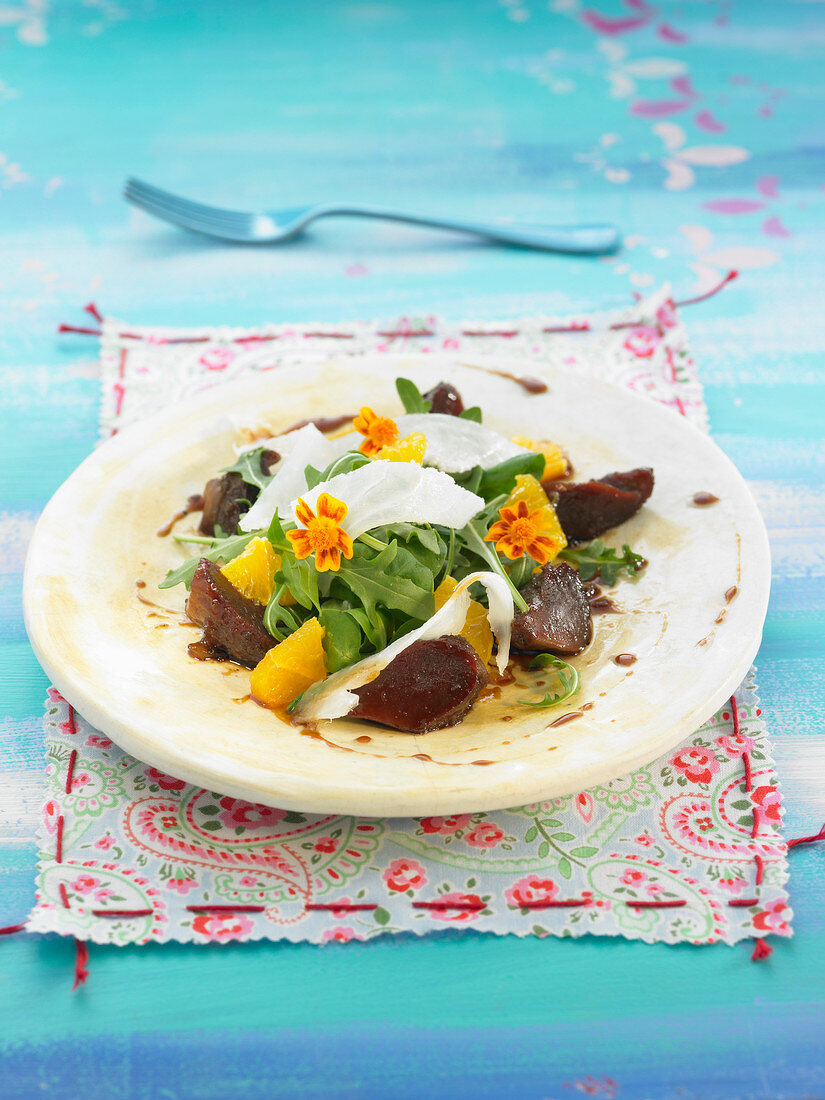 Eel, duck gizzard, rocket lettuce, orange and edible flower salad