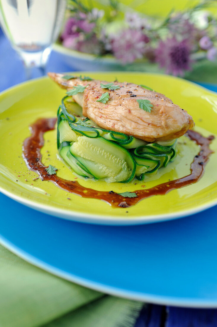 Caramelized chicken breast with zucchini strips