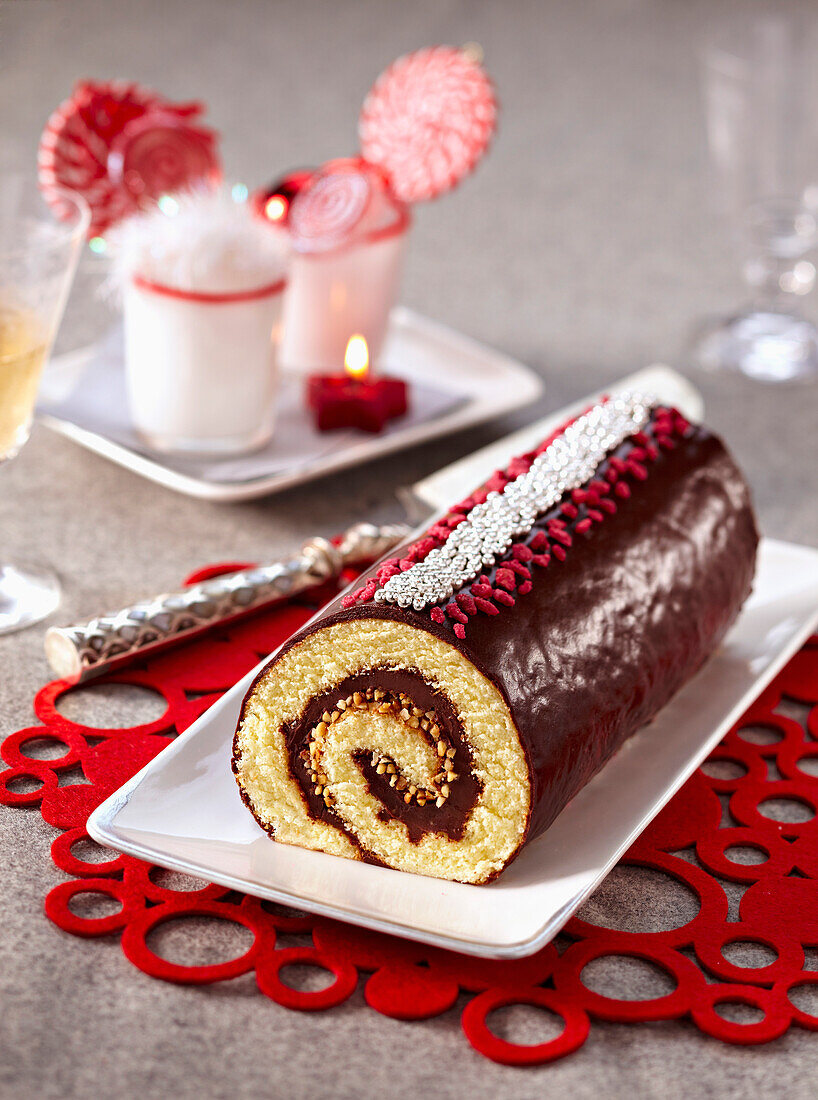 Chocolate and almond rolled log cake