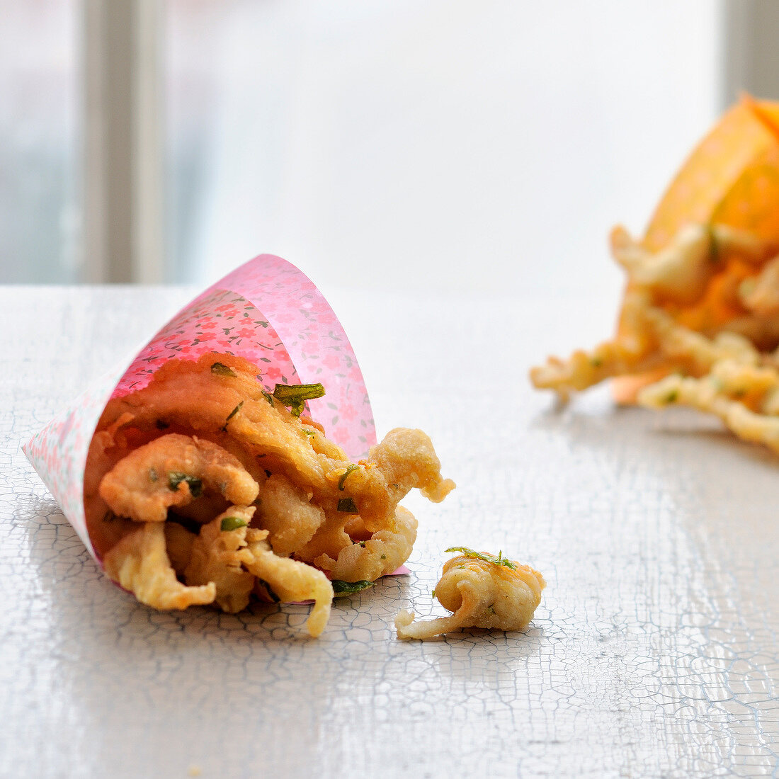 Chicken fritters in paper cones