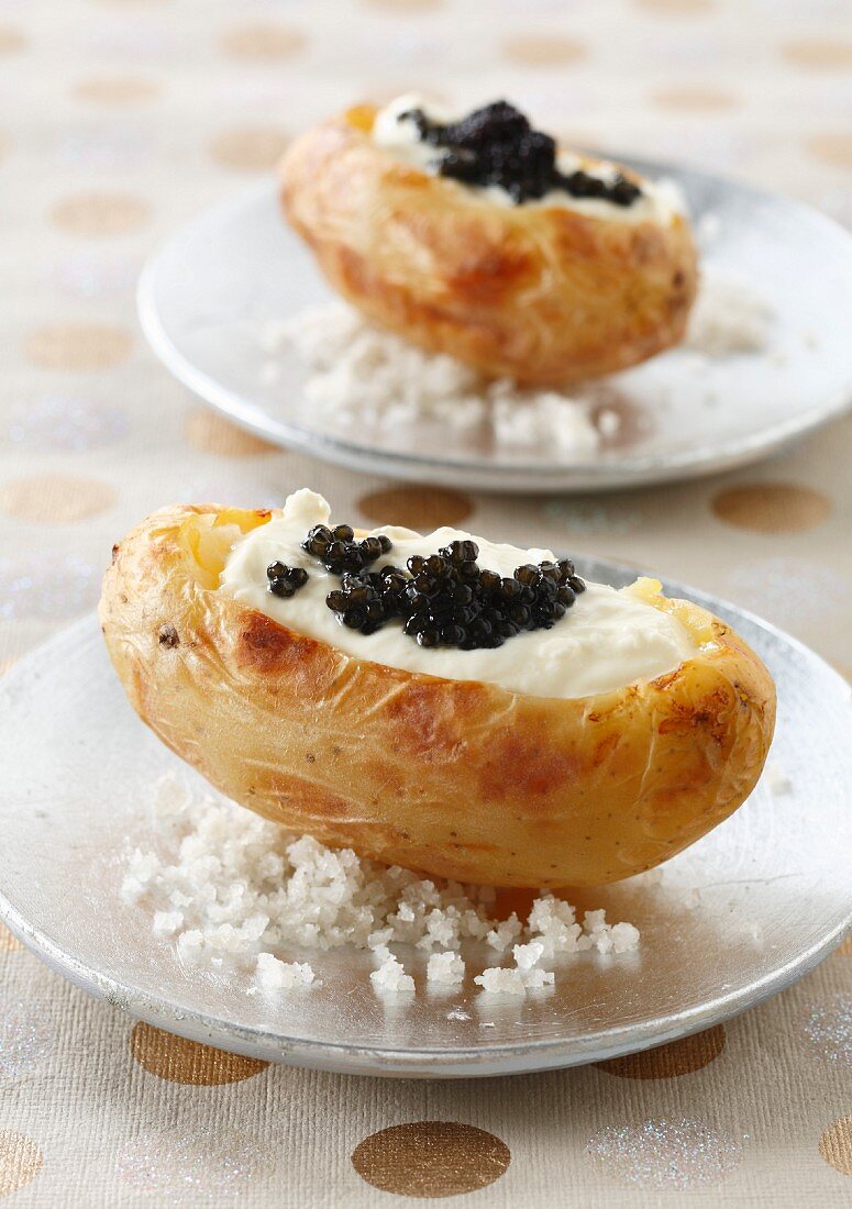 Baked potatoes with cream and fish roe