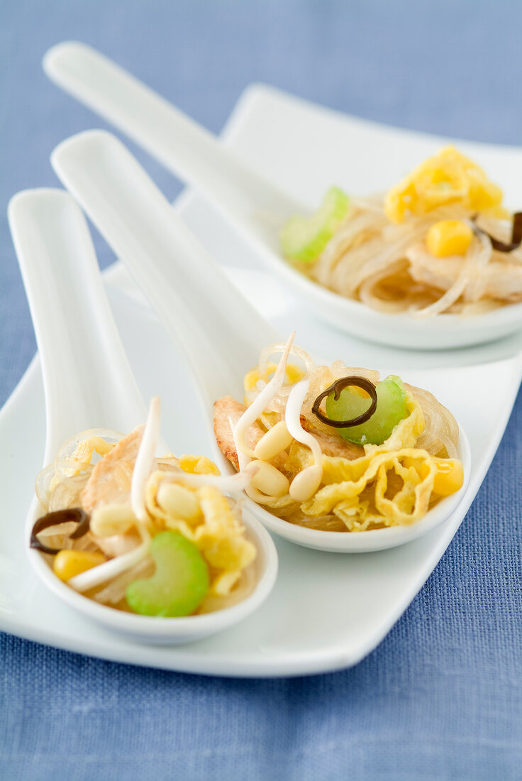 Beansprout,thinly sliced egg and celery spoons