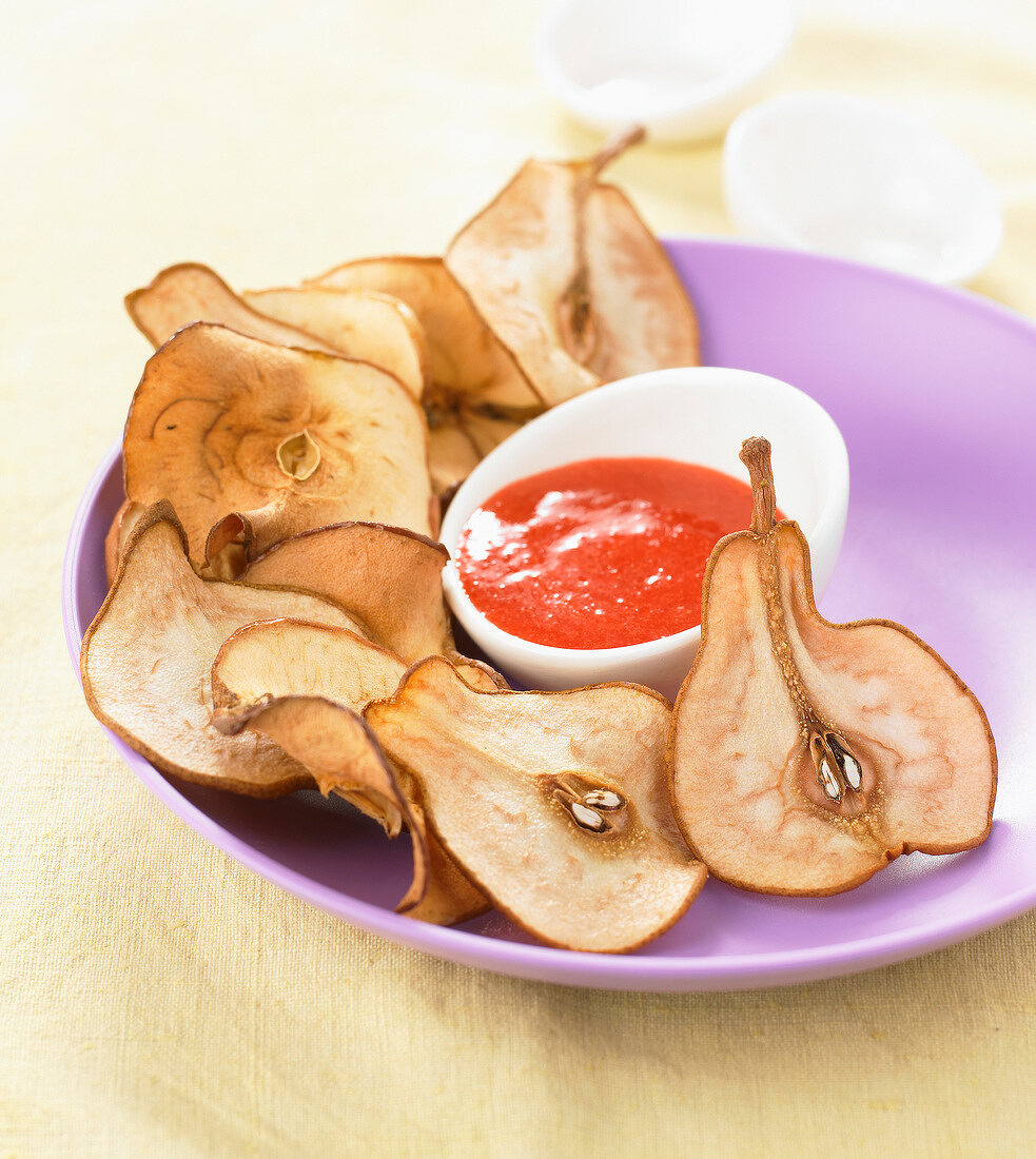 Pear crisps with strawberry puree