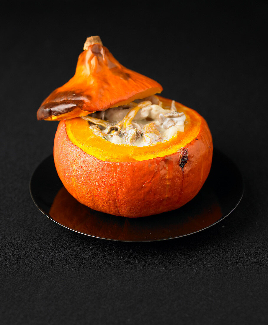 Creamy chanterelles served in a pumpkin