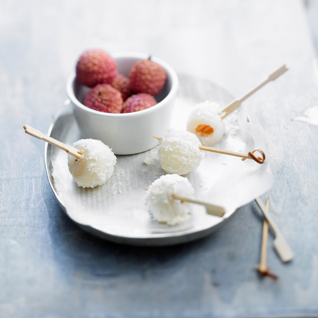 Lychees coated with coconut