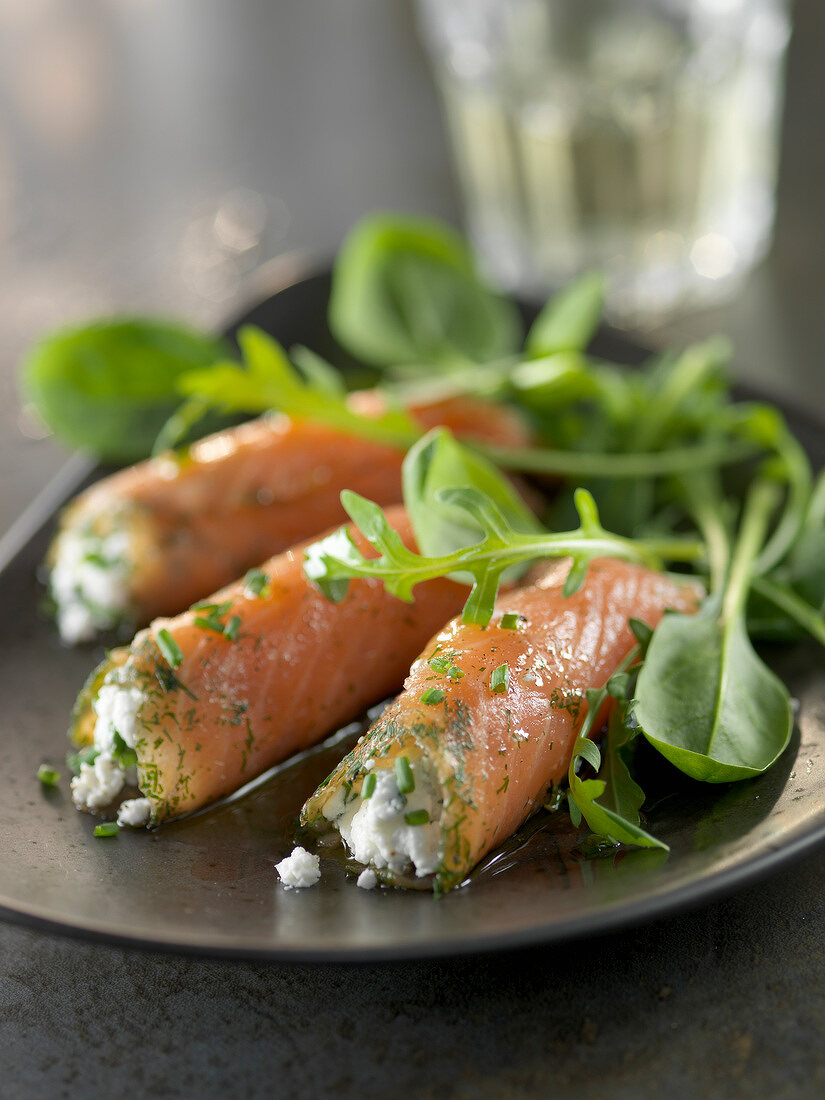 Smoked salmon rolls stuffed with ricotta and herbs