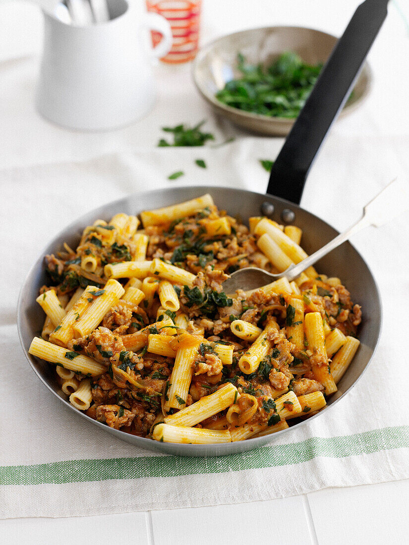 Pan-fried penne with minced pork and herbs