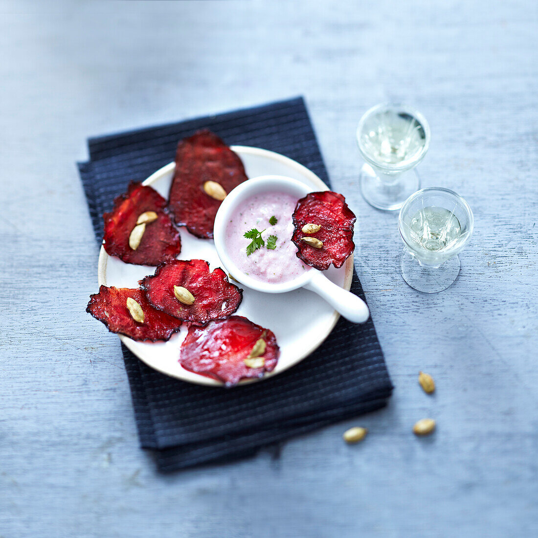 Beetroot crisps with radish and chervil creamy dip