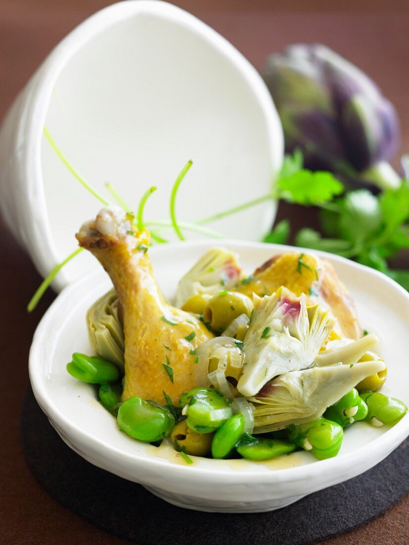 Chicken, broad bean, artichoke and green olive Tajine