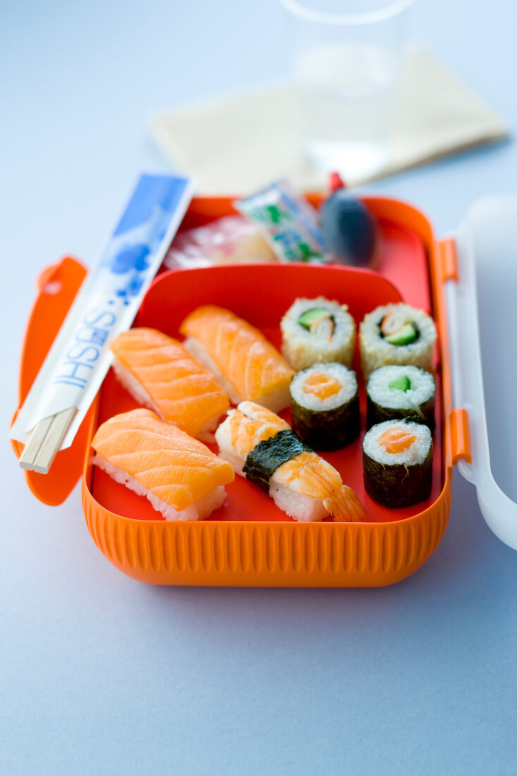 Assortment of makis and sushis in a lunch box