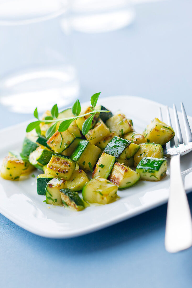 Pan-fried diced zucchini with herbs