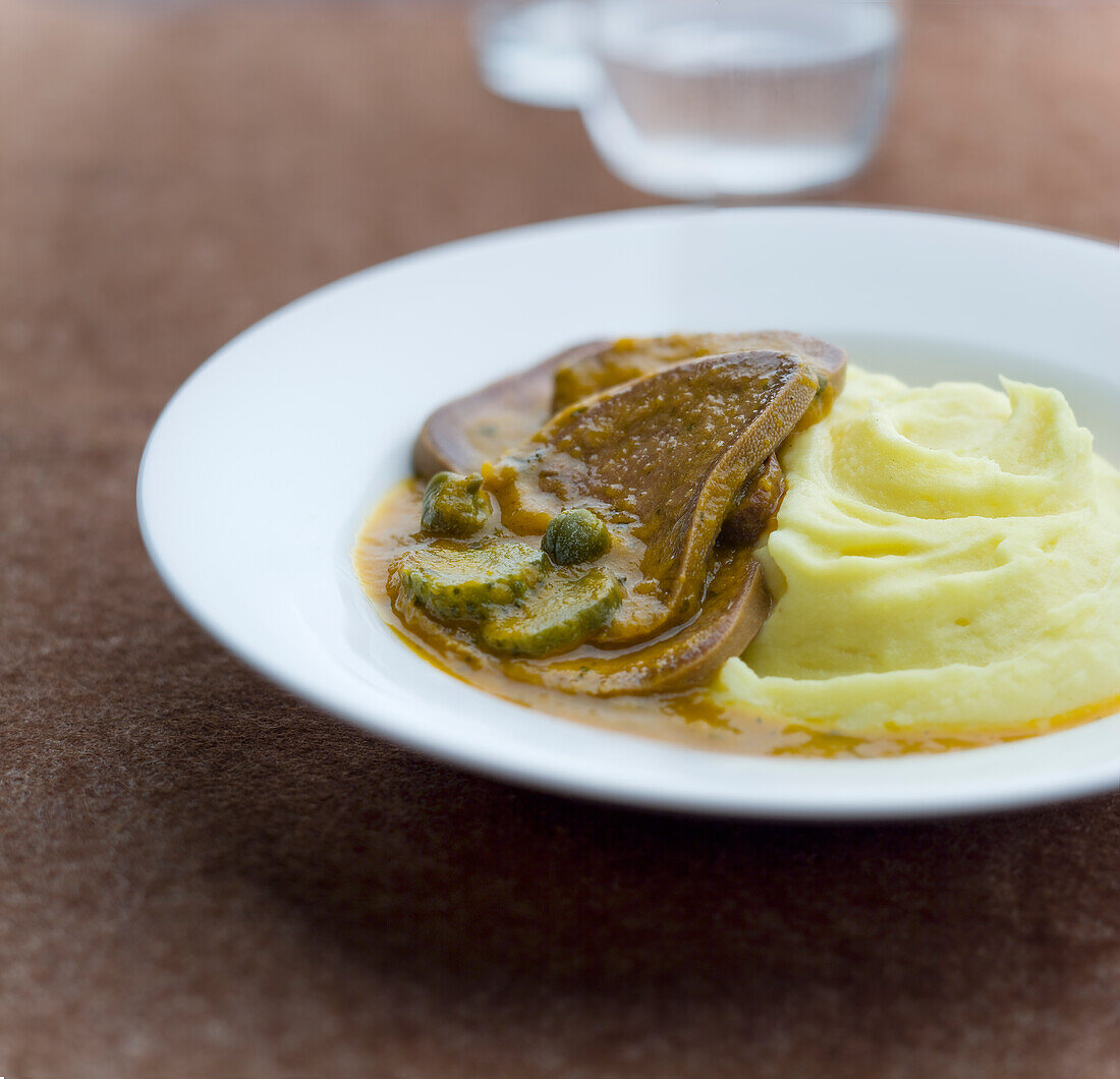 Beef tongue with gherkins and capers, mashed potatoes