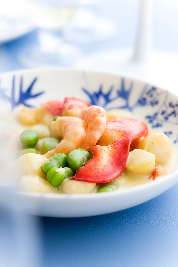 Lobster,petoncle scallop,shrimp and broad bean fricassée