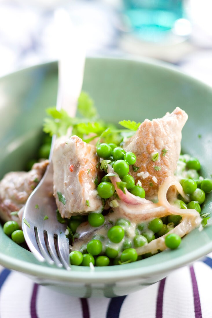 Sauteed veal with peas