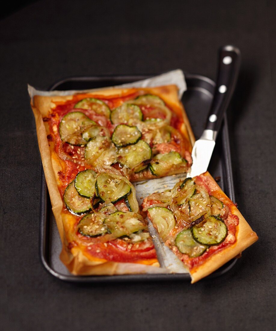 Vegetarian and sesame seed pizza