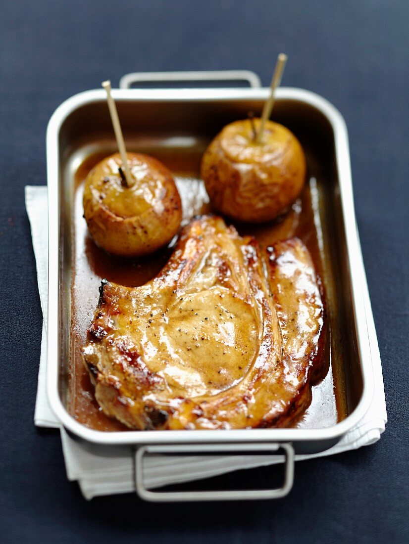 Veal chop braised in cider with apples