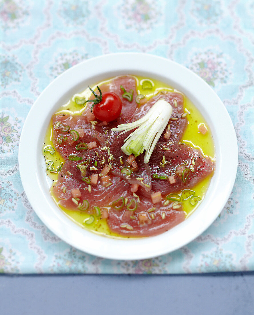 Thinly sliced tuna marinated in citrnella