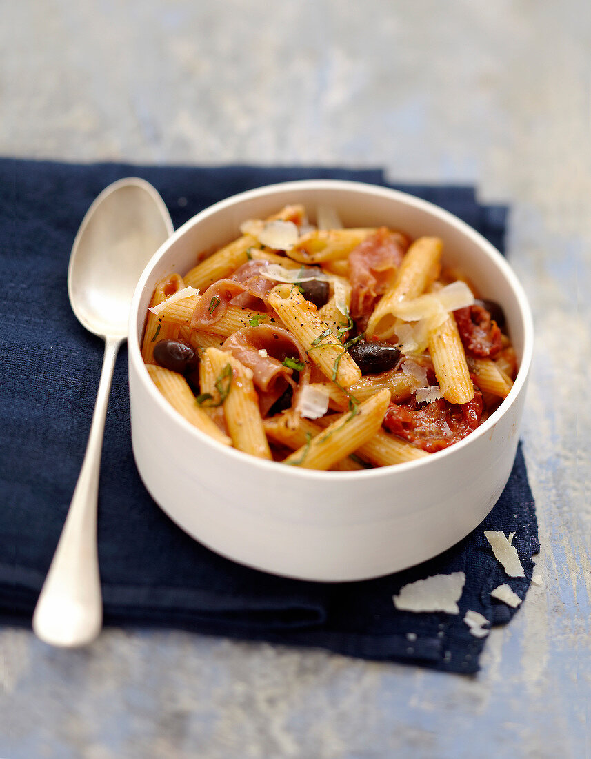 Penne with black olives,raw ham and sun-dried tomatoes