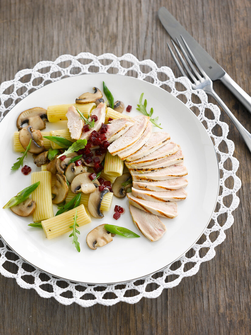 Guinea-fowl supreme with pasta,mushrooms and diced beetroot