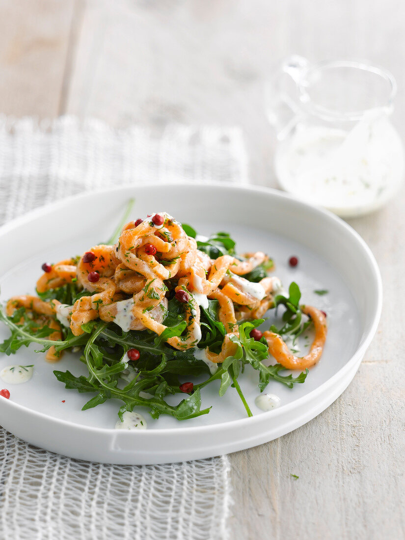 Rocket lettuce salad with marinated salmon