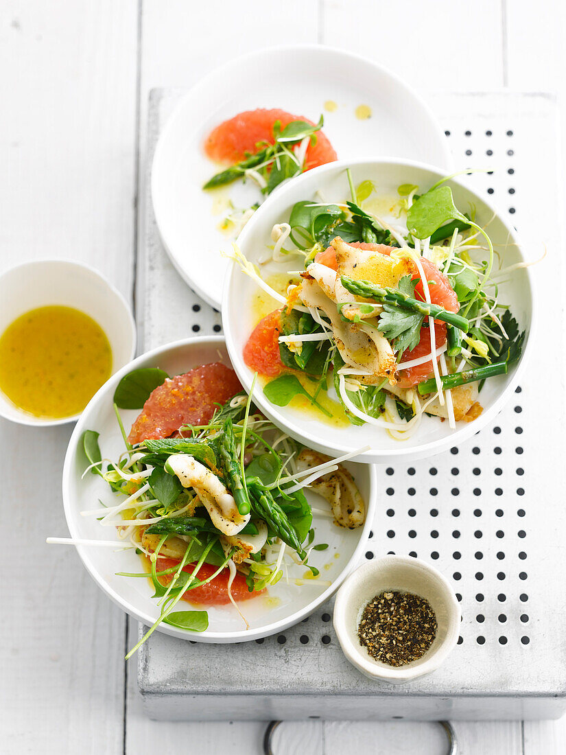 Calamary,green asparagus and grapefruit salad