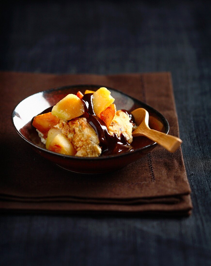 Sweet omelette with caramelized apples and chocolate sauce