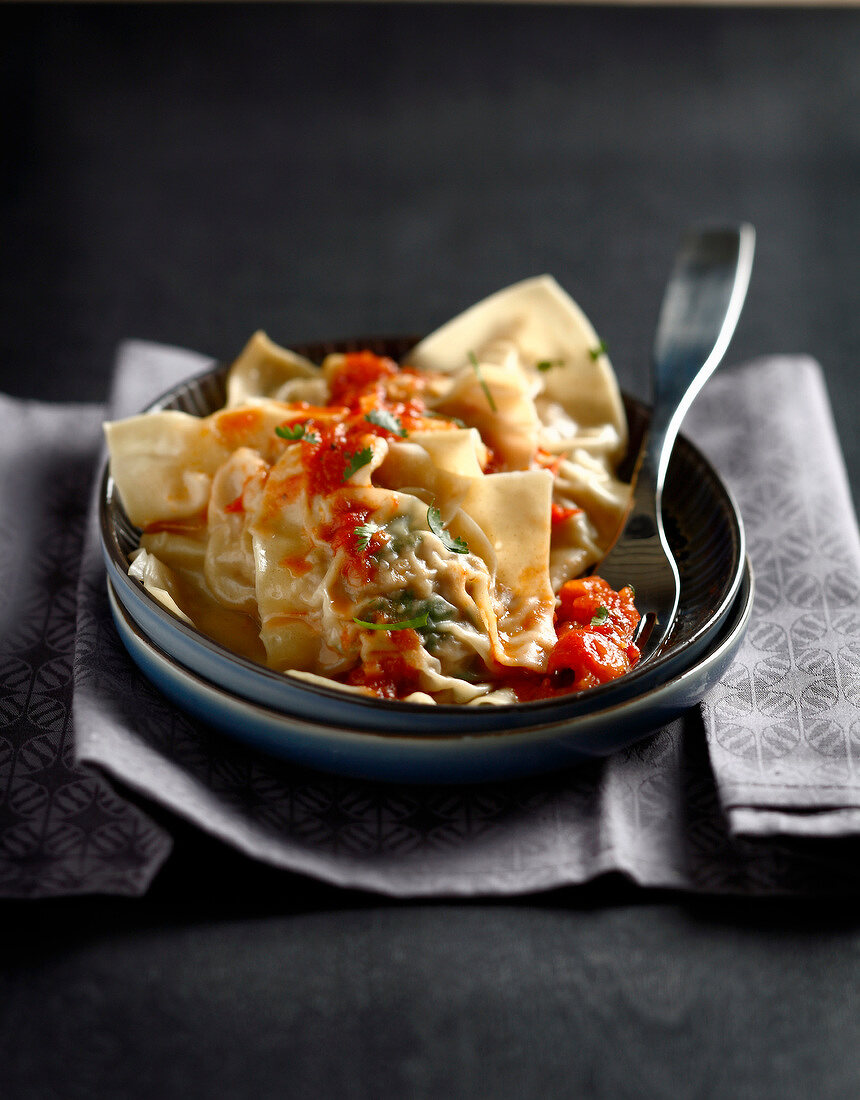 Coriander and tomato raviolis