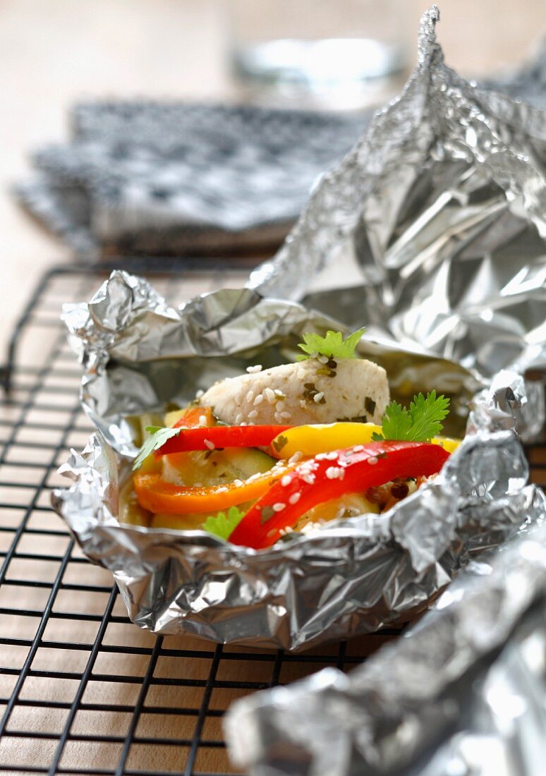 Oriental-style steamed rabbit cooked in aluminium foil