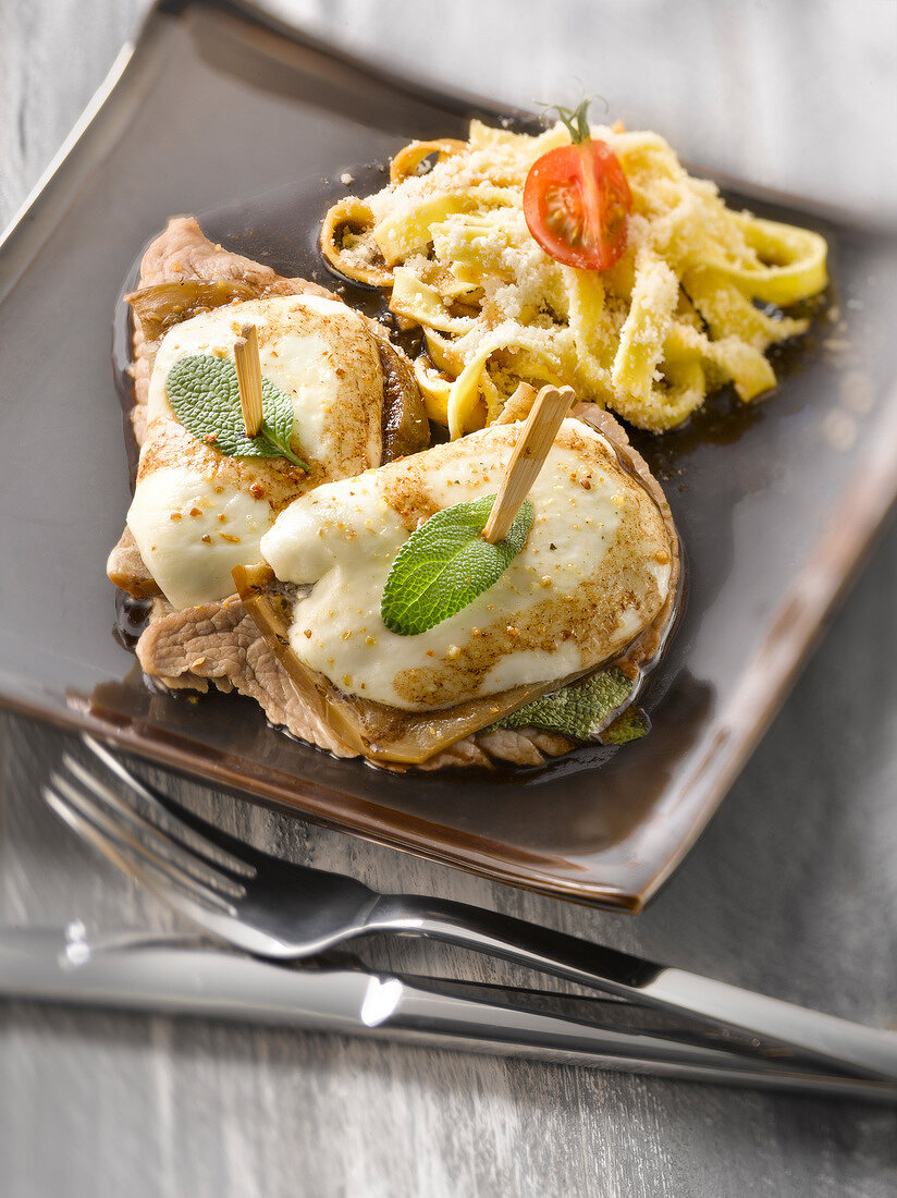 Veal Saltimbocca with mozzarella, eggplant and basil