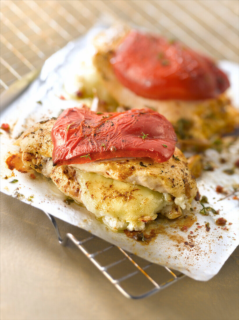 Saltimbocca-style chicken escalope with goat's cheese and red peppers