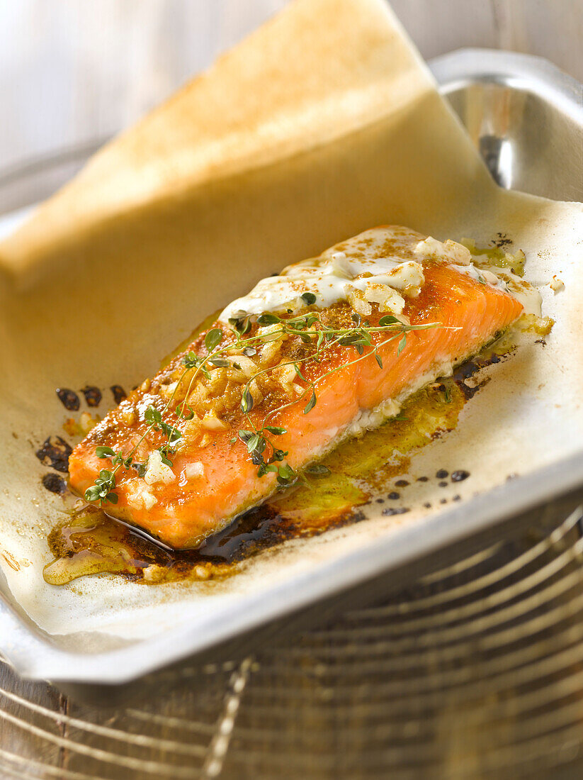 Salmon with curry,honey and ginger cooked in wax paper